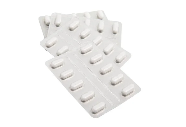 Comprimidos de medicamentos numa embalagem blister não utilizada — Fotografia de Stock