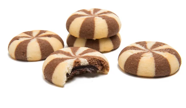 Gestreepte koekjes met chocolade geïsoleerd — Stockfoto