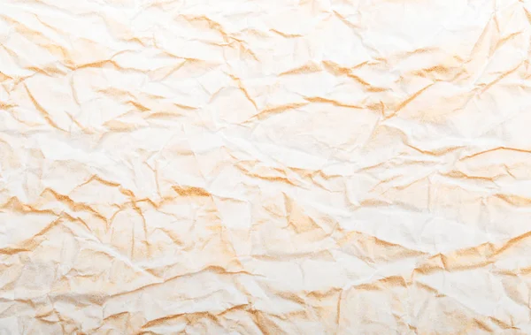 Texture of crumpled paper with gilding — Stock Photo, Image