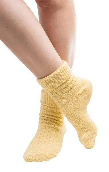Varma sockor på ben isolerade — Stockfoto