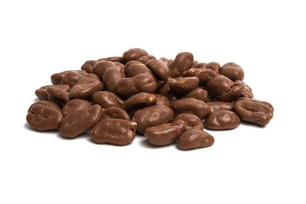 Noten in chocolade geïsoleerd — Stockfoto