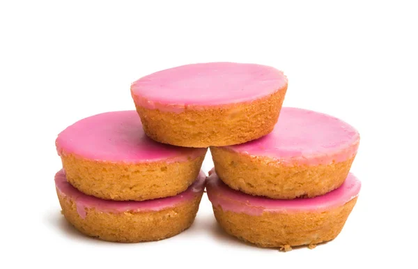 Elszigetelt rózsaszín sütemények — Stock Fotó