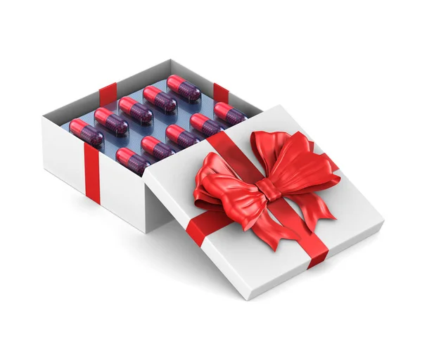 Open white gift box with set capsules on white background. Isola — Stockfoto