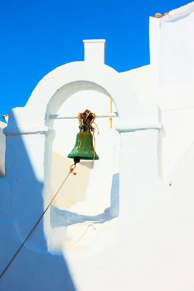 Small bell tower of ancient greek church in Mykonos town (Chora), Greece - architectural detail