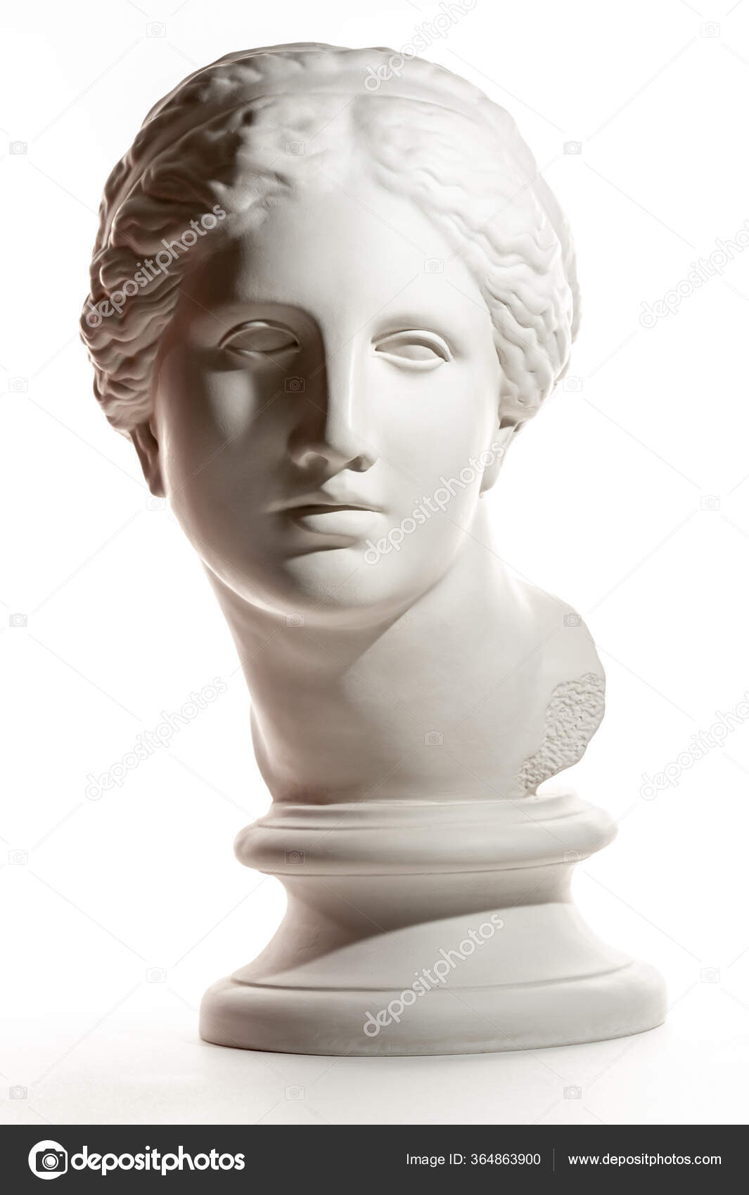 白の背景に隔離された古代の像金星の頭部の石膏のコピー。石膏彫刻女性