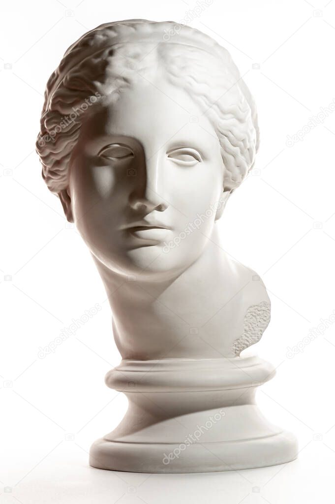 Gypsum copy of ancient statue Venus head isolated on white background. Plaster sculpture woman face.