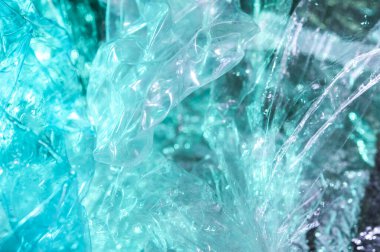 80-90 'ların tarzında holografik arkaplan. Parlak asit renklerinde selofan filmin gerçek dokusu.