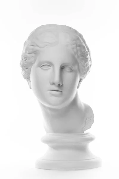 Copia de yeso de la antigua estatua Venus cabeza aislada sobre fondo blanco. Escultura de yeso cara de mujer. — Foto de Stock