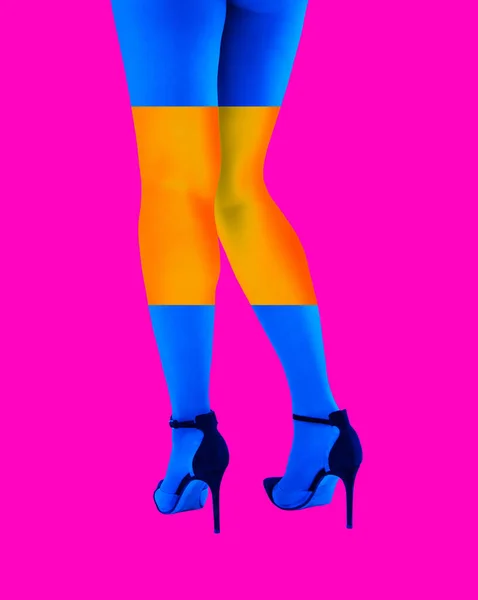 Close-up picture of womans beautiful multi-colored legs in high heels shoes on acid pink color background. Disco lights. Fasion. Surreal art. Funny modern art collage. Pop art. Zine culture. — Stock Photo, Image