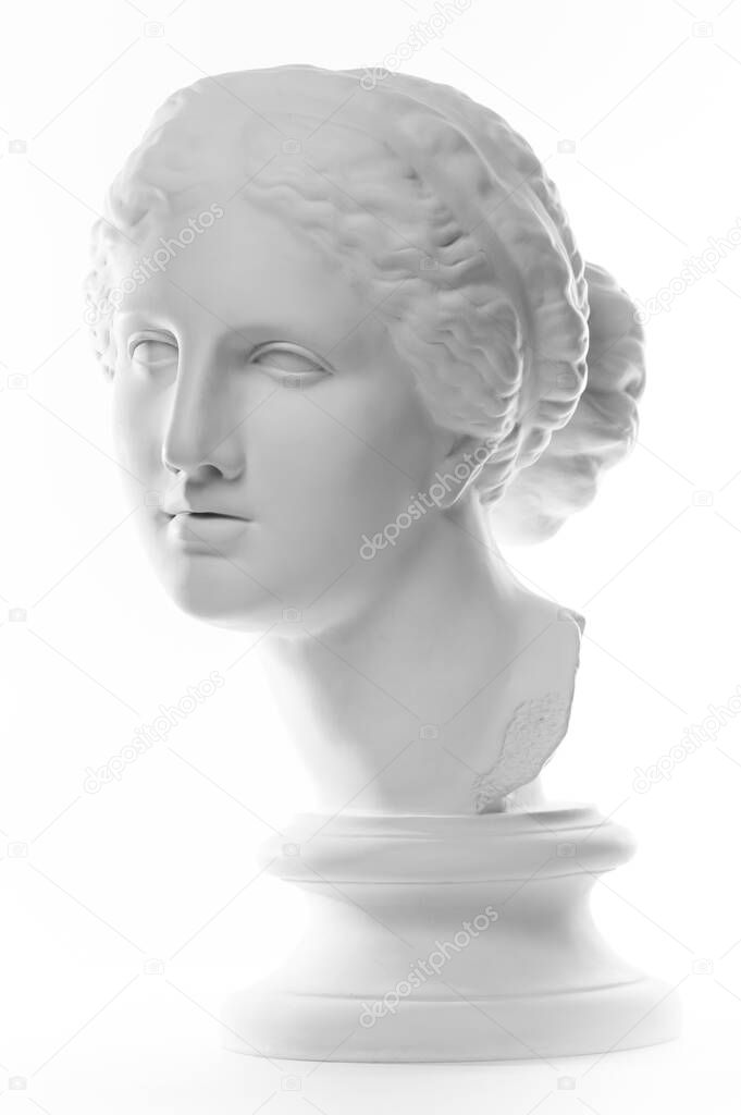 Gypsum copy of ancient statue Venus head isolated on white background. Plaster sculpture woman face.