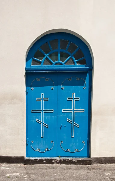 Modré dveře kostela — Stock fotografie