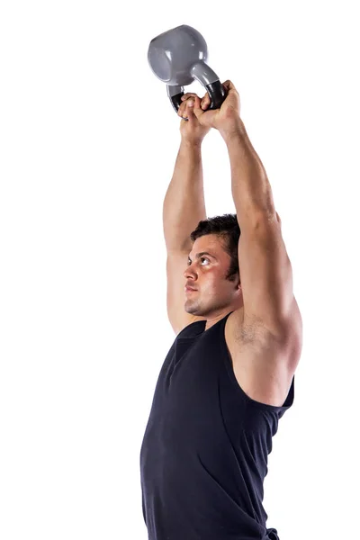 Sexy atlético homem mostrando corpo muscular com peso, isolado sobre fundo branco . — Fotografia de Stock