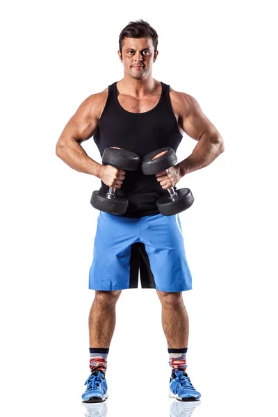 Sexy athletischen Mann zeigt muskulösen Körper mit Hanteln, volle Länge, isoliert über weißem Hintergrund. — Stockfoto