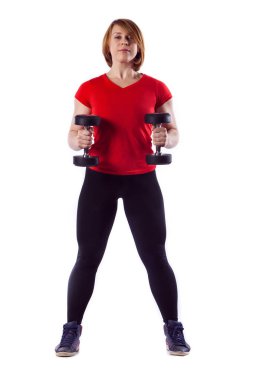 Güzel kadın dumbbells ile egzersizleri yapmak uygun