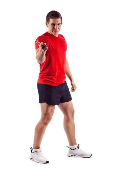 Muscle man posing in studio, isolated over a white background — Stock Photo, Image