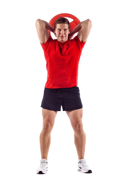 Muscular guy doing exercises with dumbbells over white backgroun — Stock Photo, Image