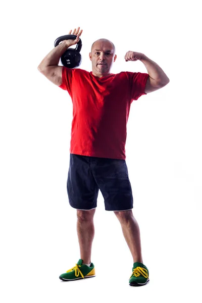 Mature male doing exercises with weights. Isolated on white — Stock Photo, Image