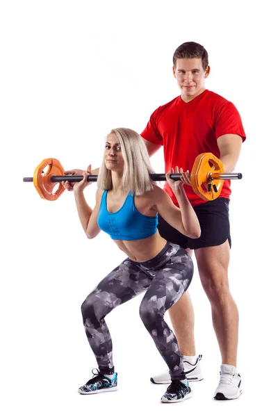 Couple, man and woman doing workout on white isolated background — Stock Photo, Image