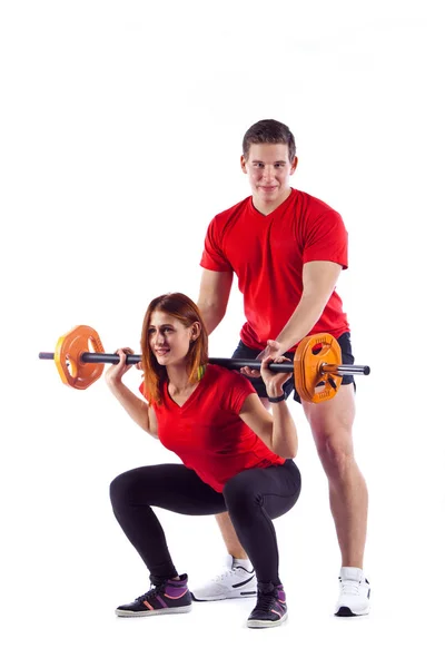 Couple, man and woman doing workout on white isolated background — Stock Photo, Image