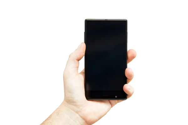 Hand holding black bezelless smartphone with blank screen on white background — Stock Photo, Image