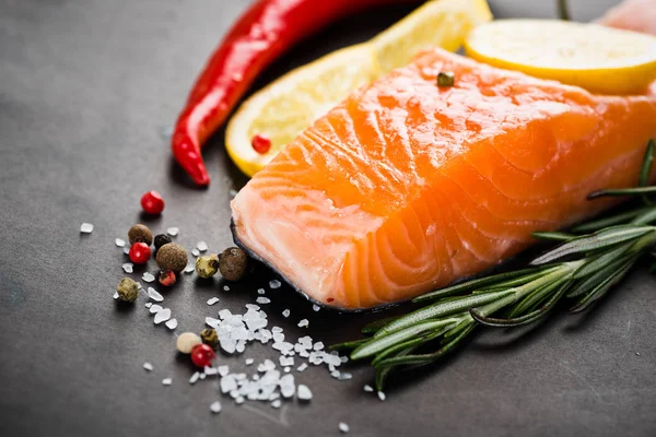 Fresh salmon with spices — Stock Photo, Image