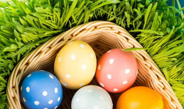 Easter eggs in basket — Stock Photo, Image