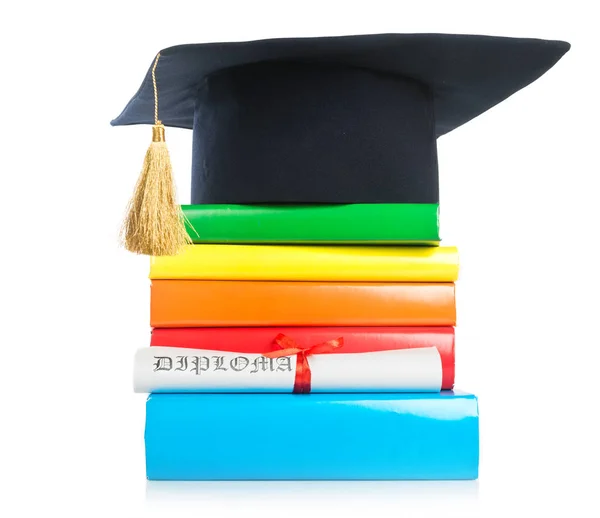Mortarboard and graduation scroll — Stock Photo, Image