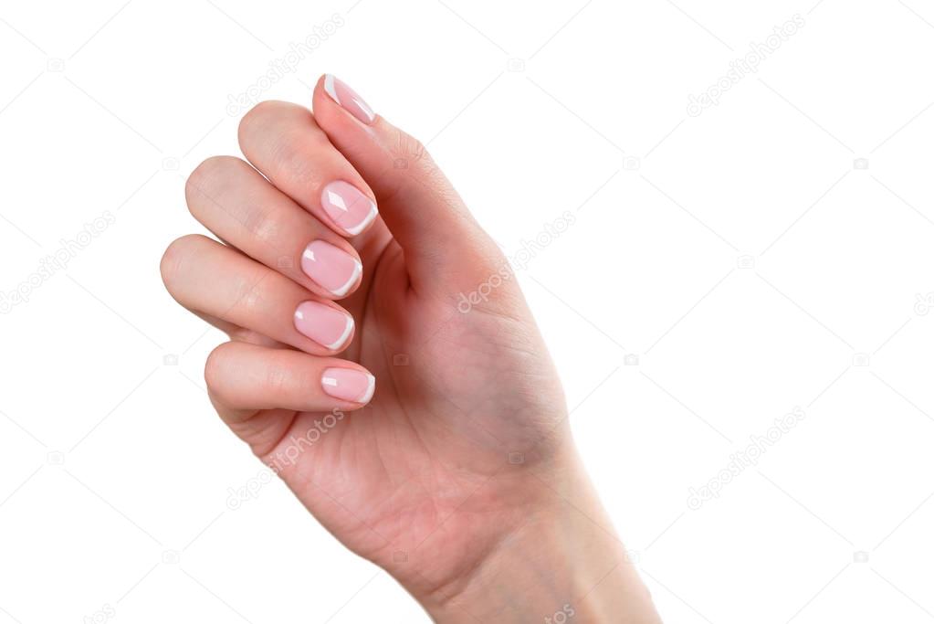 female hand with french manicure 