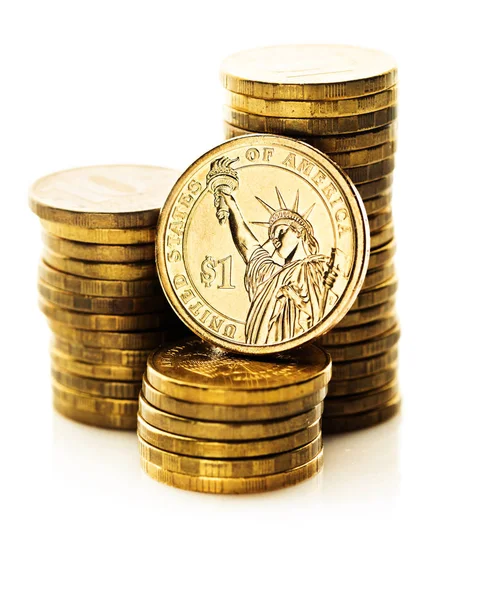 Hromady dolarových mincí — Stock fotografie