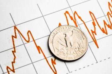 one dollar coin on fluctuating graph. Rate of the us dollar (shallow DOF) clipart