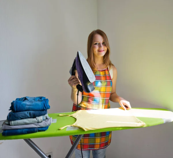 Young Beautiful Woman Ironing Clothes Room Grey Backgroun — Stock Photo, Image