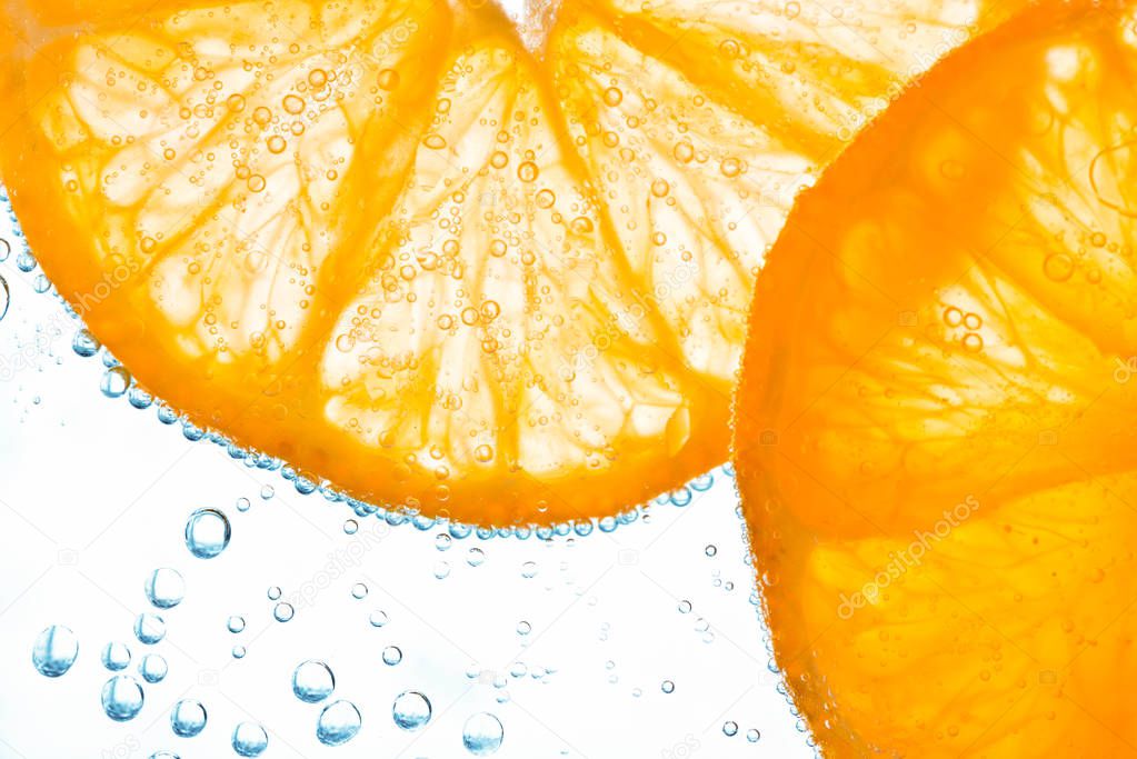 orange with bubbles isolated on white background