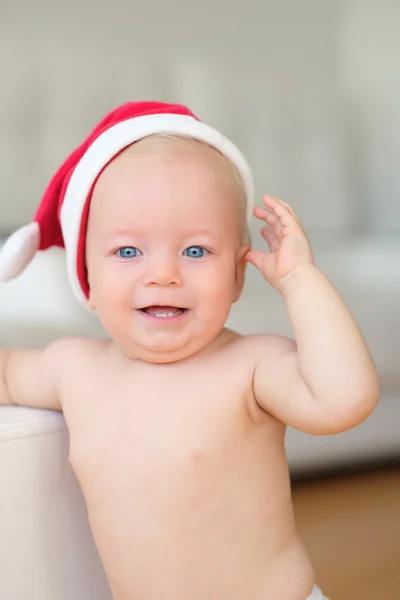 Baby mit Weihnachtsmann-Mütze — Stockfoto