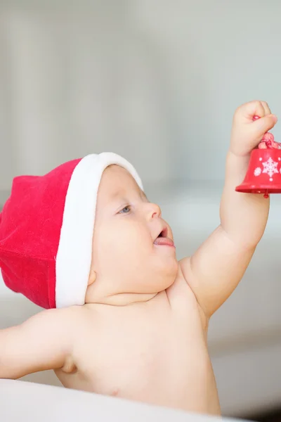 Dítě v Santa Claus klobouk — Stock fotografie