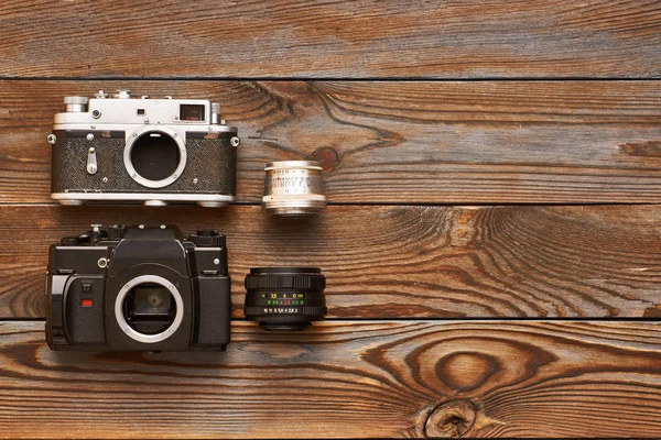 Vintage old cameras and lenses — Stock Photo, Image