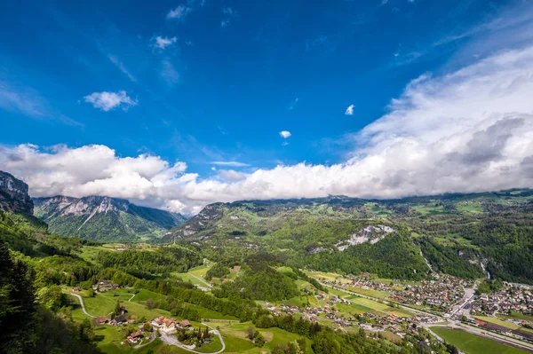 Swiss village in valley — Stock Photo, Image