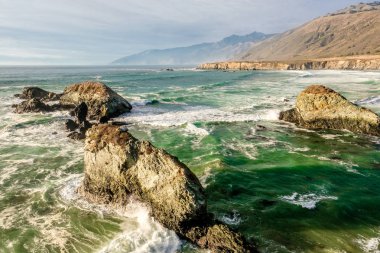 Rocks at Pacific coast in California clipart