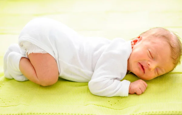 One week old newborn baby