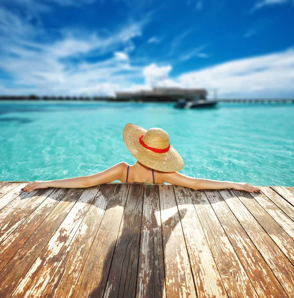 Woman at poolside — Stock Photo, Image