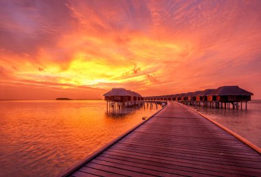 Sunset at Maldivian beach clipart