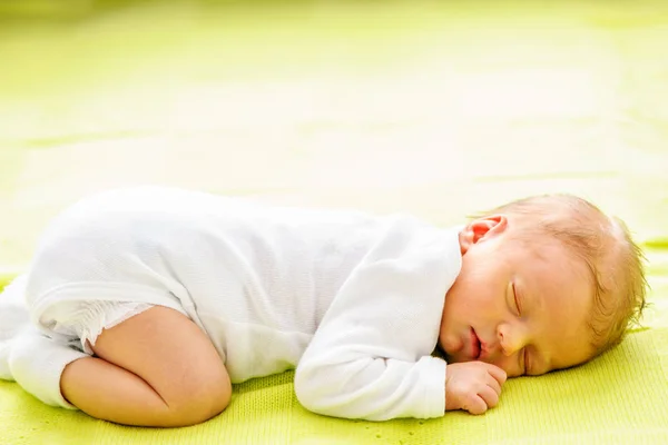 One week old newborn baby