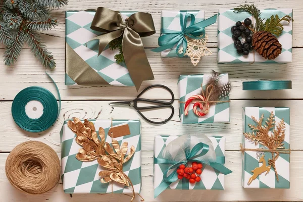 Christmas presents on wooden background — Stock Photo, Image