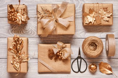 Christmas presents on wooden background  clipart