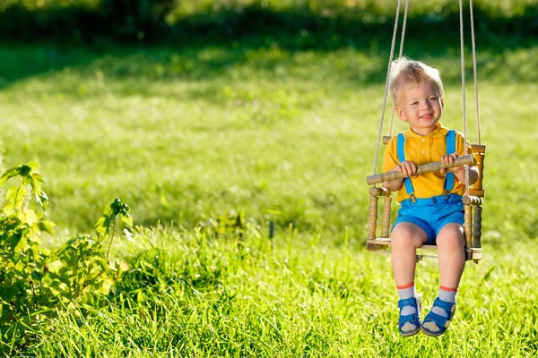 Full Length Portrait Little Blonde Boy Swinging Outdoors — Stock Photo, Image