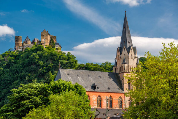 Schonburg Castle and Liebfrauenkirche (Church of Our Lady) at Rhine Valley (Rhine Gorge) near Oberwesel, Germany. Built some time between 1100 and 1149.