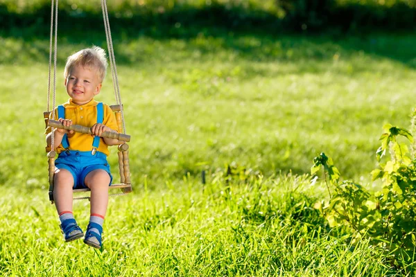 Toddler Boy Swinging Swing Backyard — Stock Photo, Image