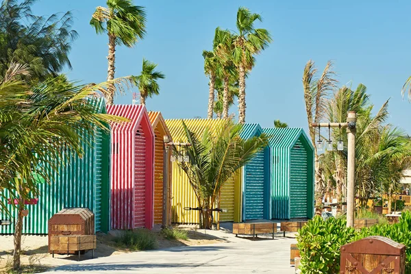 Colored beach bathing cabins in Dubai, United Arab Emirates