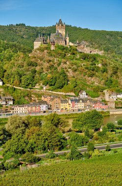 Cochem town in Germany on Moselle river with Reichsburg castle clipart