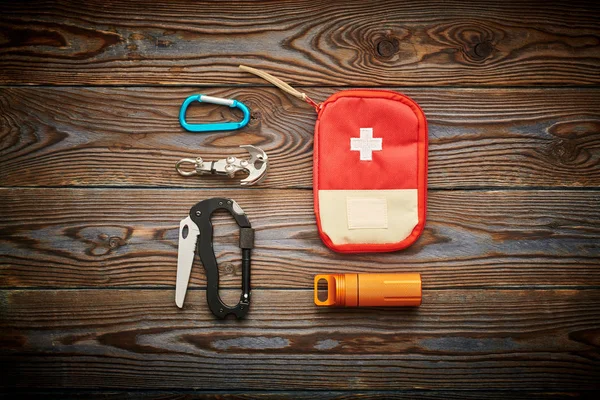 Travel items for hiking over wooden background — ストック写真