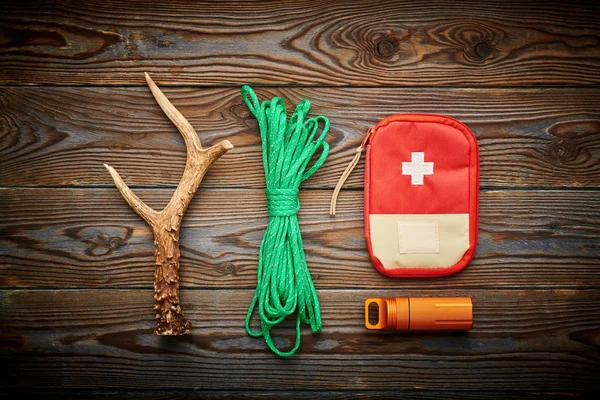 Travel items for hiking over wooden background — Stock Photo, Image